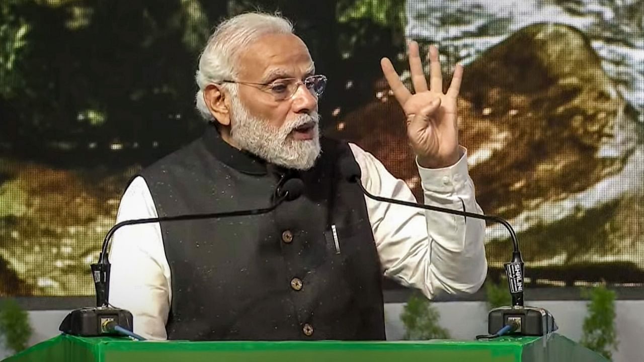 Prime Minister Narendra Modi addresses at the session of commemoration of 50 years of Project Tiger, at Mysuru University. Credit: PTI Photo