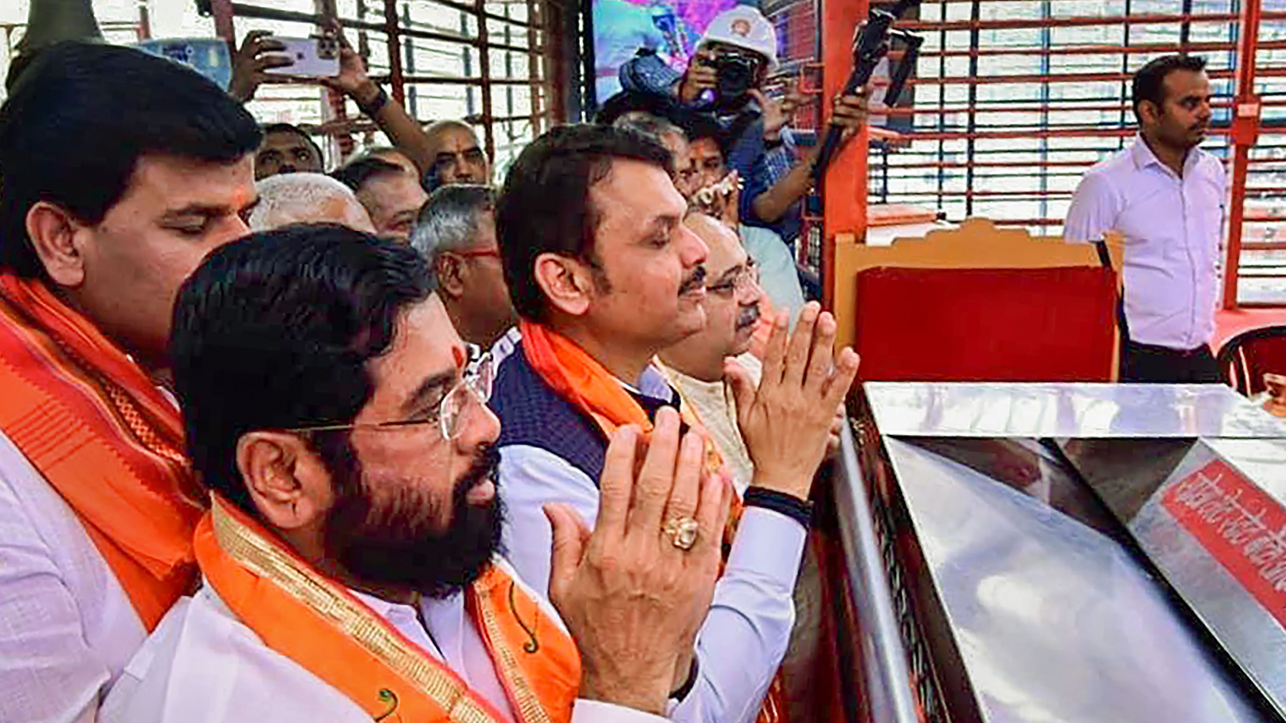 Maharashtra Chief Minister Eknath Shinde with Deputy CM Devendra Fadnavis offers prayers to Ram Lala (Lord Rama), in Ayodhya, Sunday, April 9, 2023. Credit: PTI Photo