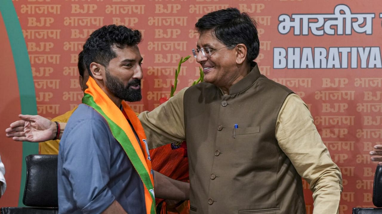 Anil Antony, son of Congress veteran and former defence minister AK Antony, with Union Minister and senior BJP leader Piyush Goyal after the former joined the Bharatiya Janata Party (BJP), in New Delhi, Thursday, April 6, 2023. Credit: PTI Photo