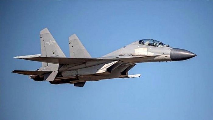 In this undated file photo released by the Taiwan Ministry of Defense, a Chinese PLA J-16 fighter jet flies in an undisclosed location. Credit: AP/PTI File Photo