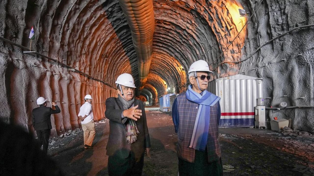 Union Minister for Road Transport & Highways Nitin Gadkari with J&K Lt. Governor Manoj Sinha inspects the construction work of Zojila Tunnel at Baltal area in Ganderbal district. Credit: PTI Photo