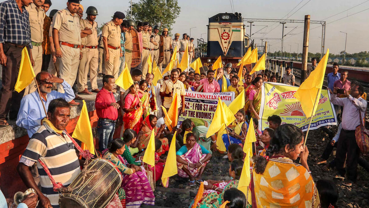 Members of Kurmi community block railway tracks demanding Scheduled Tribe (ST) status, at Balurghat in South Dinajpur district of West Bengal. Credit: PTI Photo