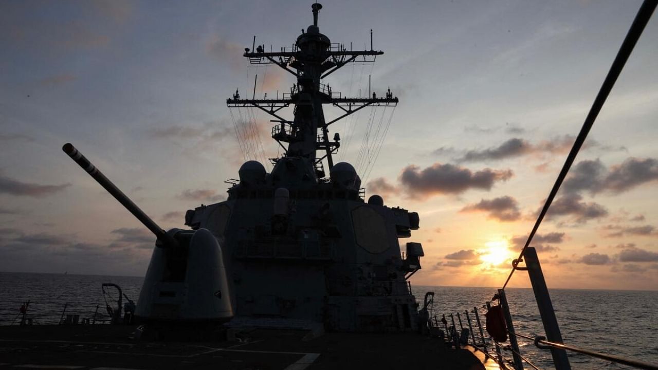 This handout photo from the US Navy taken on March 27, 2023 shows the US Navy's Arleigh Burke-class guided-missile destroyer USS Milius (DDG 69) conducting operations in the South China Sea. Credit: AFP Photo/US Navy/Gregory Johnson