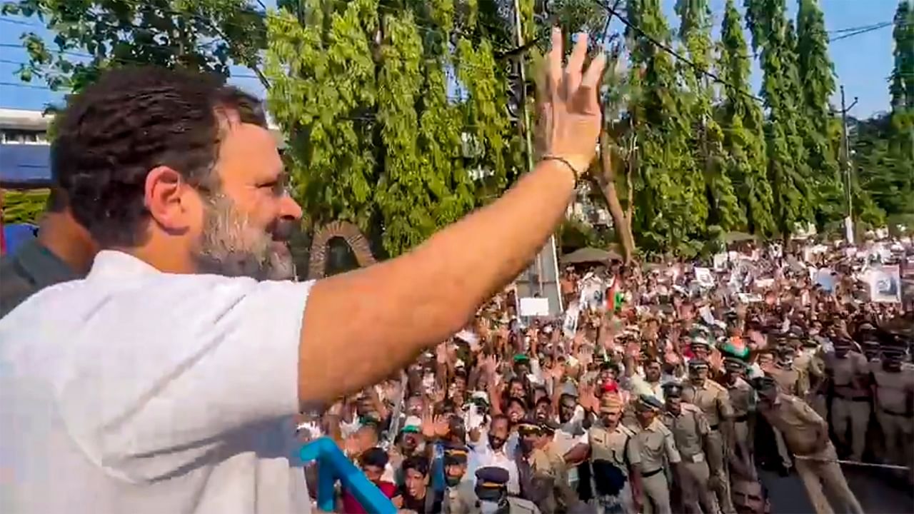 Congress leader Rahul Gandhi waves at supporters upon his arrival at Kalpetta in Wayanad, Tuesday, April 11, 2023. Credit: PTI Photo/Twitter: @INCIndia