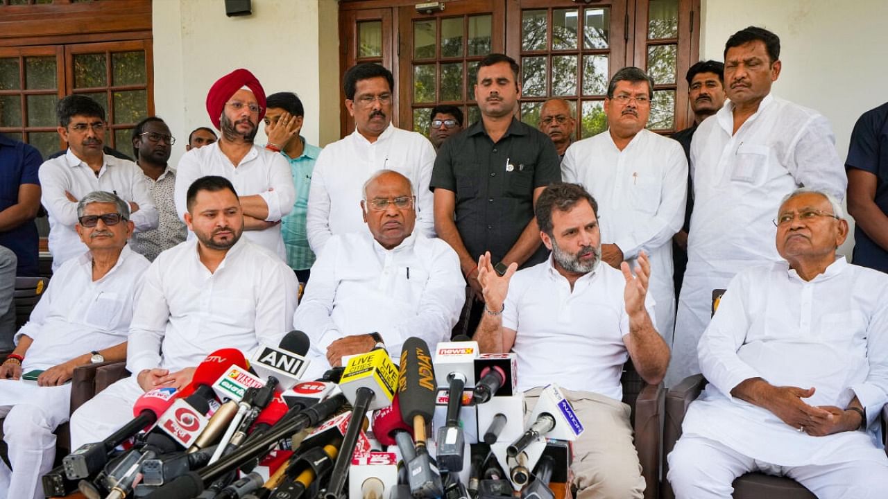 Congress leader Rahul Gandhi with Bihar Chief Minister Nitish Kumar, Congress President Mallikarjun Kharge, Bihar Deputy Chief Minister Tejashwi Yadav and JD (U) President Rajiv Ranjan Singh addresses the media at Kharge's residence, in New Delhi. Credit: PTI Photo