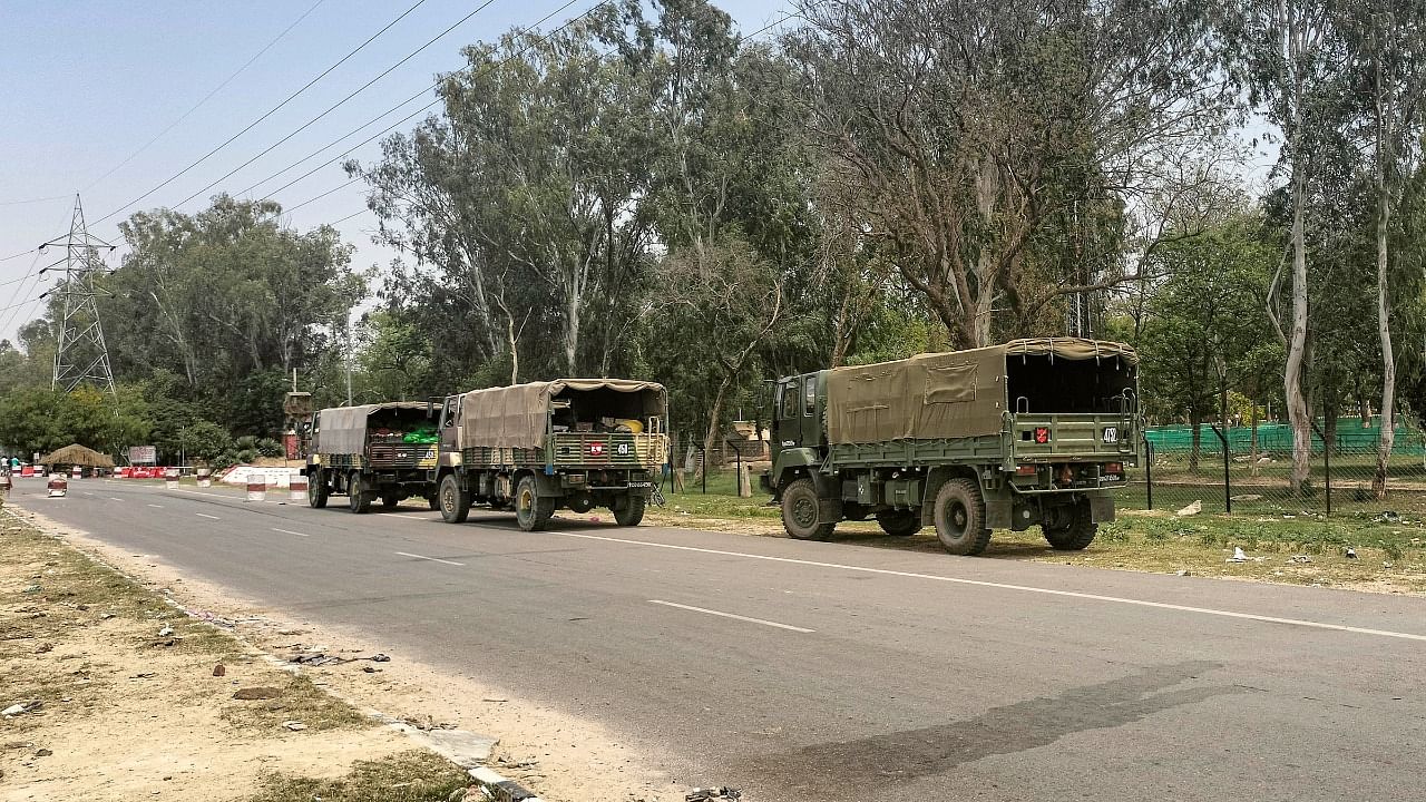 Army vehicles outside the Bathinda military station where a firing incident took place. Credit: PTI Photo