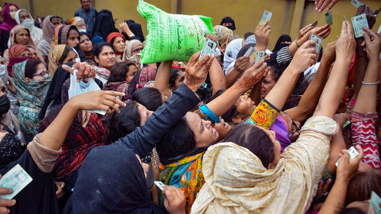 Women at a free flour store in Lahore. Credit: PTI Photo