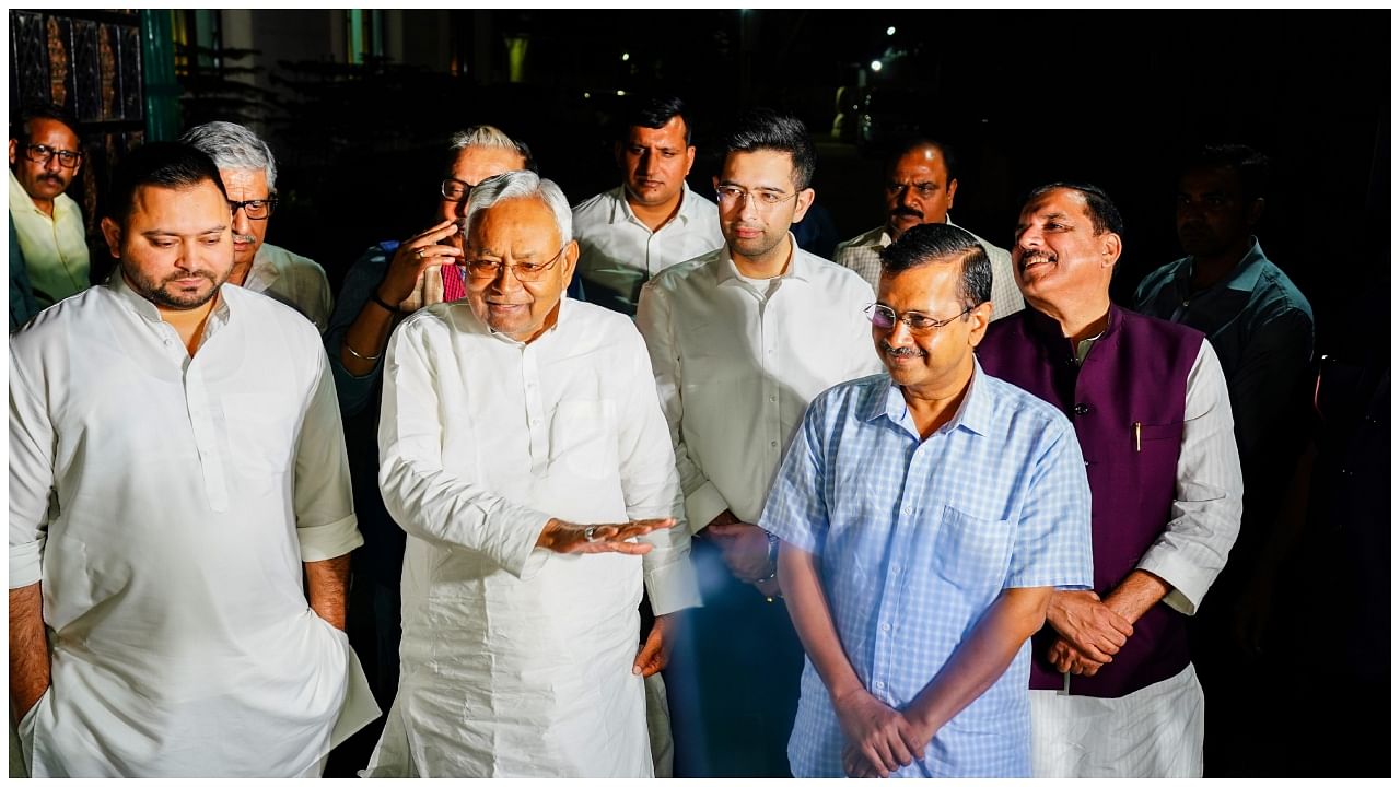 Delhi Chief Minister Arvind Kejriwal with Bihar Chief Minister Nitish Kumar and Bihar Deputy Chief Minister Tejashwi Yadav. Credit: PTI Photo