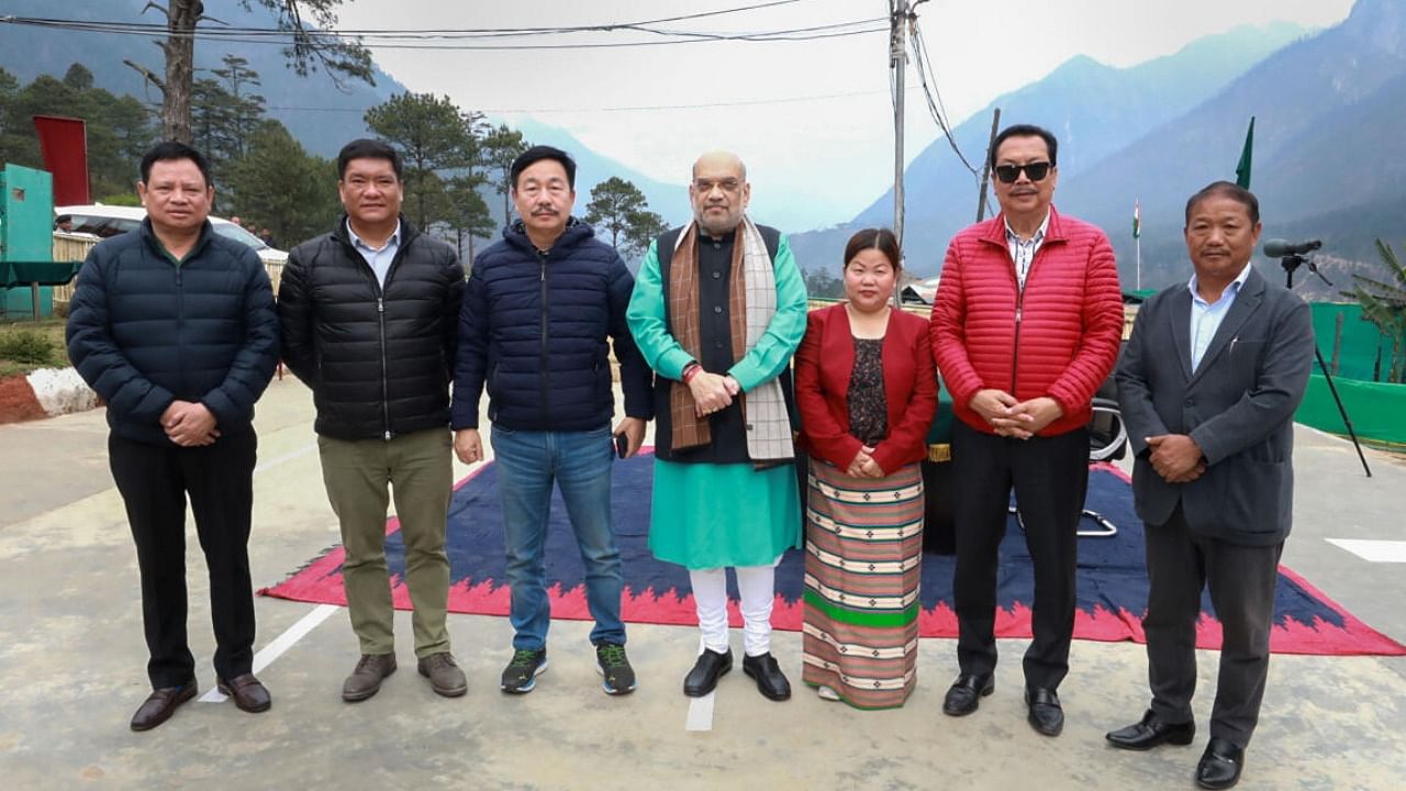 Amit Shah with Arunachal Pradesh Chief Minister Pema Khandu and other ministers during his visit to the state. Credit: PTI File Photo