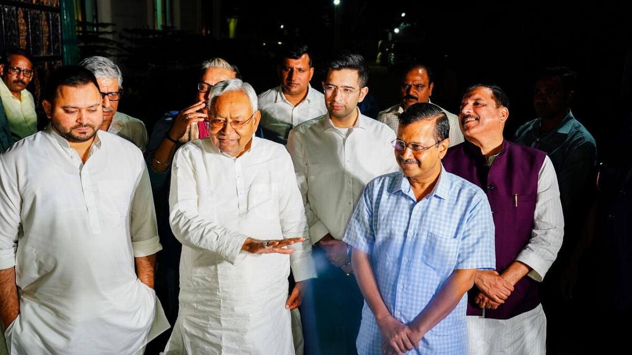 Delhi Chief Minister Arvind Kejriwal with Bihar Chief Minister Nitish Kumar and Bihar Deputy Chief Minister Tejashwi Yadav addresses the media after a meeting, in New Delhi, Wednesday, April 12, 2023. Credit: PTI Photo