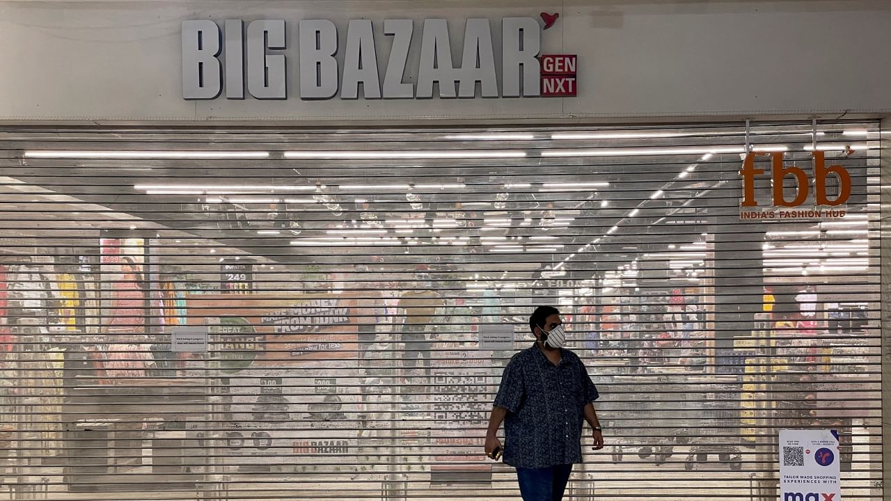  A man walks past Future Retail's closed Big Bazaar store in Ahmedabad, March 2, 2022. Credit: Reuters File Photo