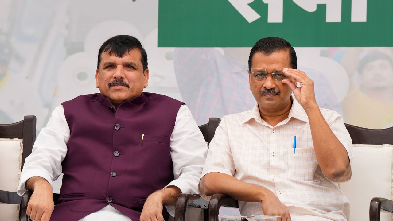 Delhi Chief Minister and Aam Aadmi Party (AAP) convenor Arvind Kejriwal with party leader and Rajya Sabha MP Sanjay Singh. Credit: PTI Photo