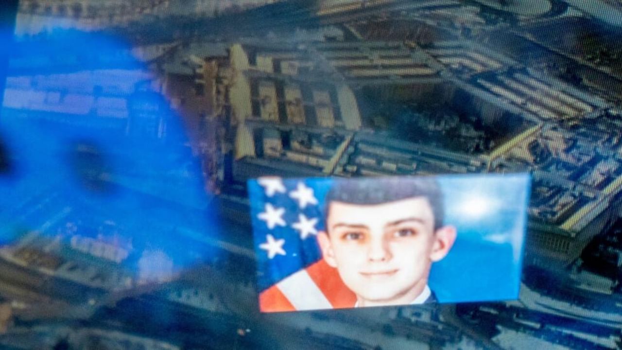 This photo illustration created on April 13, 2023, shows the Discord logo and the suspect, national guardsman Jack Teixeira, reflected in an image of the Pentagon in Washington, DC. Credit: AFP Photo