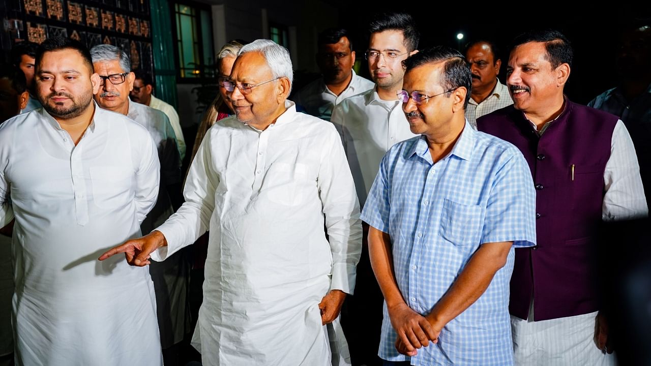 Delhi Chief Minister Arvind Kejriwal with Bihar Chief Minister Nitish Kumar and Bihar Deputy Chief Minister Tejashwi Yadav addresses the media after a meeting, in New Delhi, Wednesday, April 12, 2023. Credit: PTI Photo