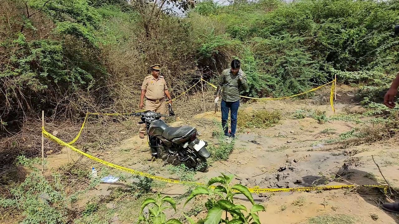 Police personnel at the site of the encounter in which jailed mafia Atiq Ahmad's son Asad was killed by the UP STF, in Jhansi. Credit: PTI Photo