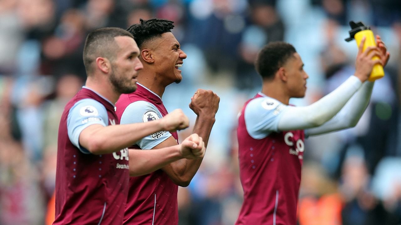 Aston Villa's Ollie Watkins and John McGinn celebrate after the match. Credit: Reuters Photo