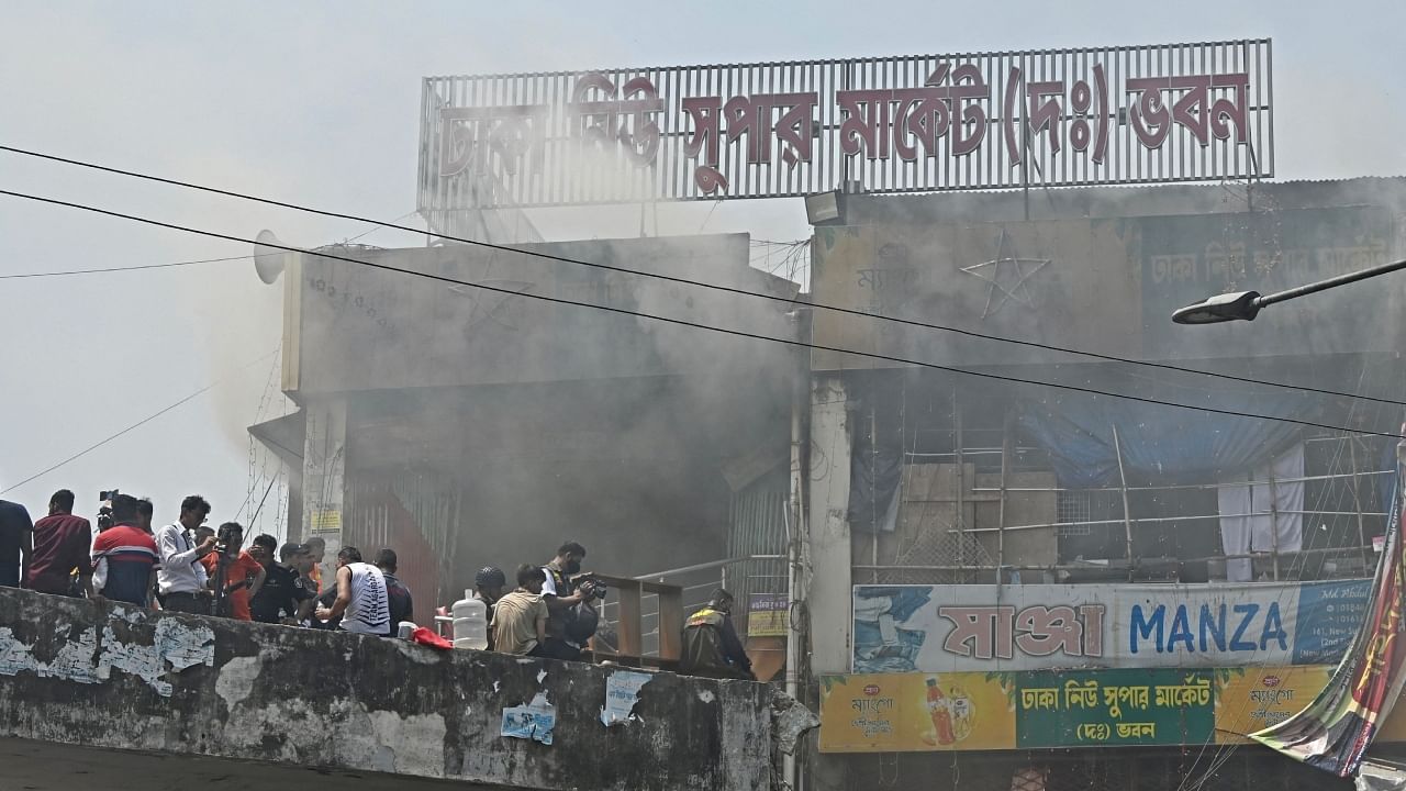 Firefighters extinguish the fire after it broke out at a market in Dhaka on April 15, 2023. Credit: AFP Photo