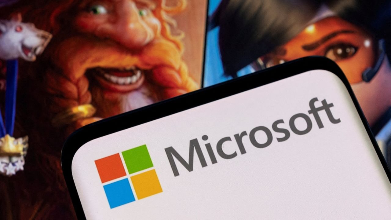 Microsoft logo is seen on a smartphone placed on displayed Activision Blizzard's games characters in this illustration. Credit: Reuters File Photo