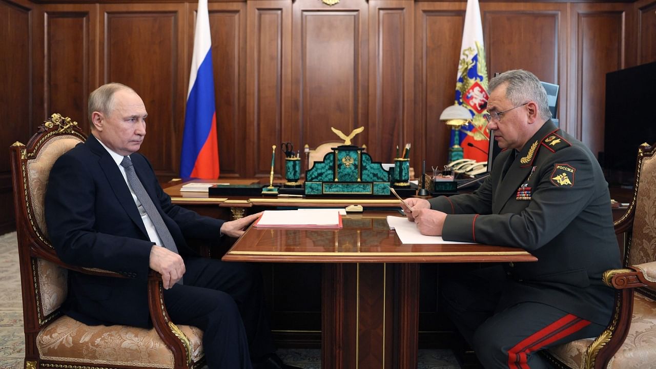 Russian President Vladimir Putin meets with Defence Minister Sergei Shoigu in Moscow on April 17, 2023. Credit: AFP Photo