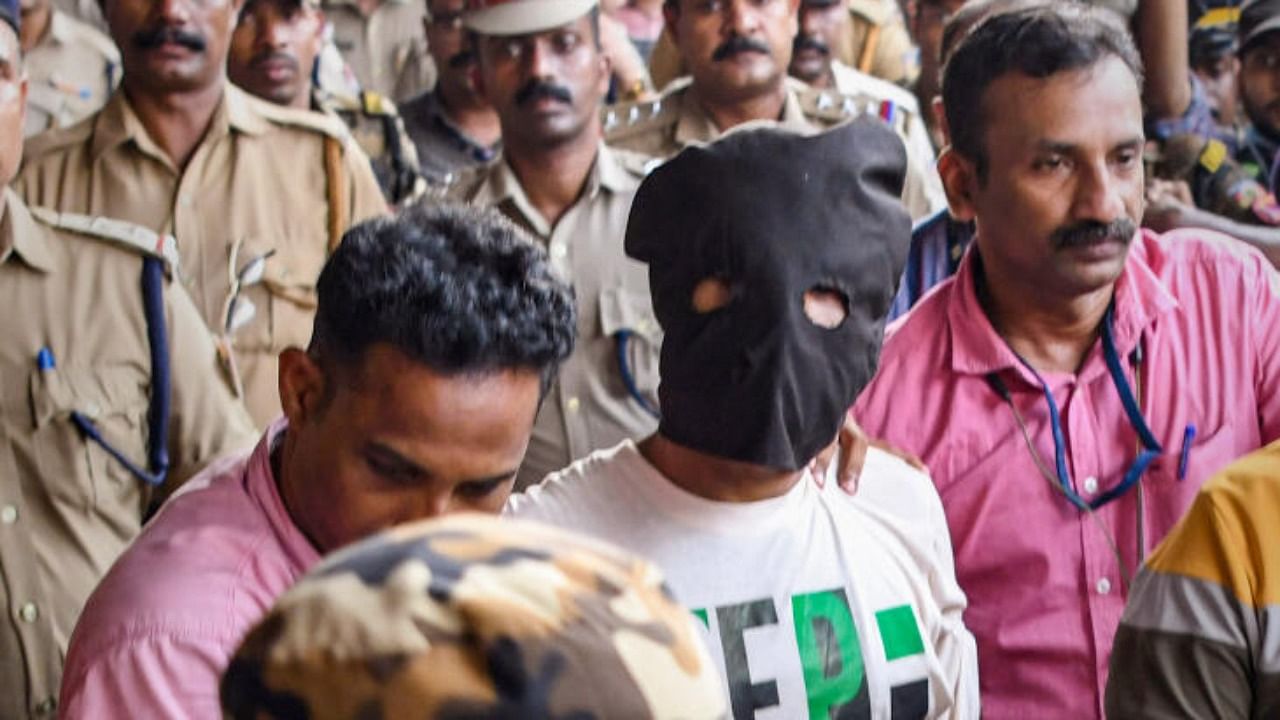 Shahrukh Saifi, accused in the Kerala train arson incident brought for further investigation in Kannur. Credit: PTI File Photo