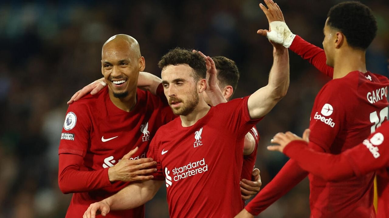 Liverpool's Diogo Jota celebrates scoring their fifth goal with Fabinho and Cody Gakpo. Credit: Reuters Photo