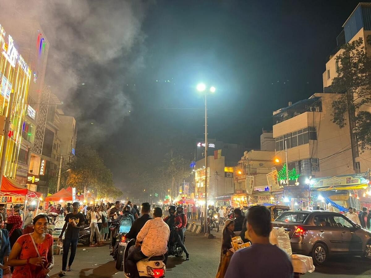 MM Road was packed with crowds and vehicles on Monday evening.