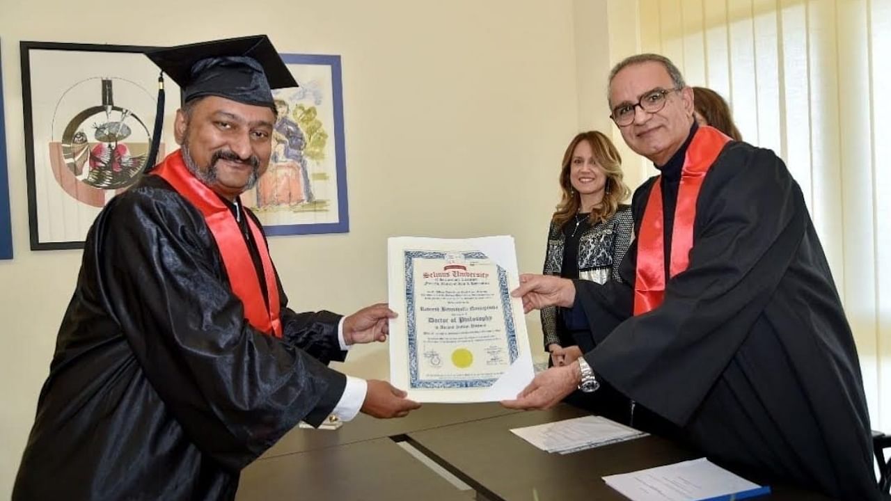 Dr B N Raveesh receives his PhD degree in Ancient Indian History from Salvatore Fava, president and general consultant of Selinus University. Credit: Special Arrangement