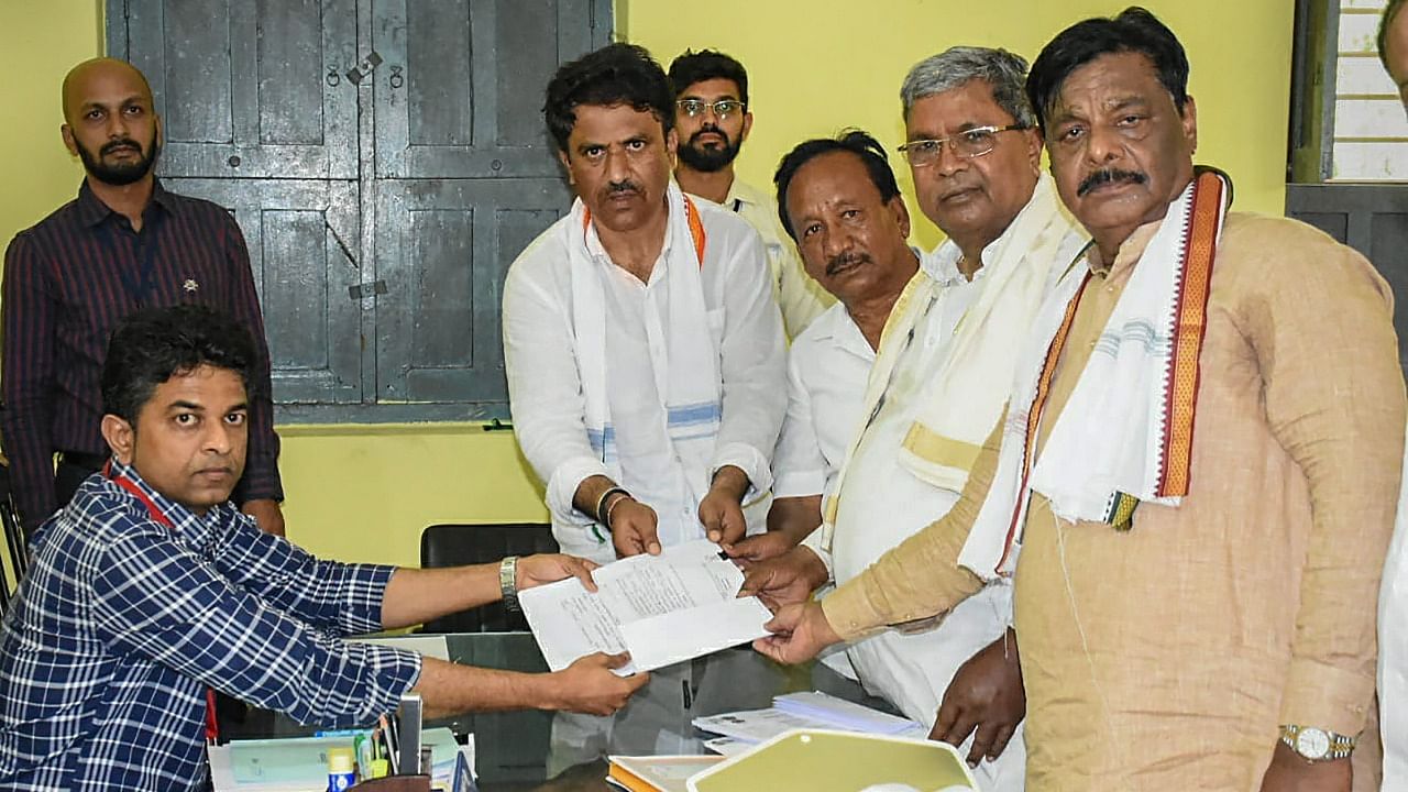 Senior Congress leader and party candidate from Varuna seat Siddaramaiah files his nomination papers. Credit: PTI Photo