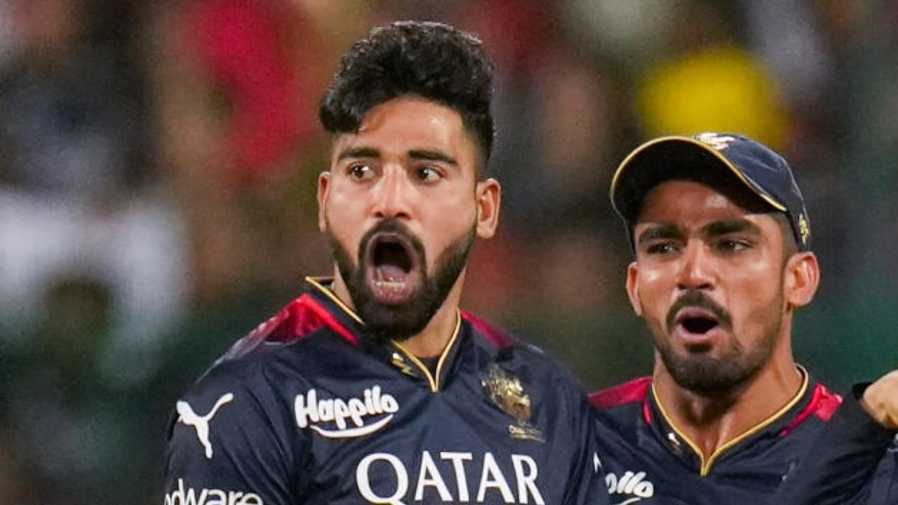 Royal Challengers Bangalore (RCB) pacer Mohammed Siraj (L). Credit: PTI Photo