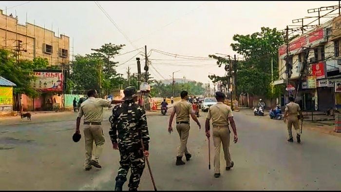 Sambalpur: Security personnel during a curfew imposed after the incident of fresh violence on the occasion of Hanuman Jayanti, in Sambalpur, Saturday, April 15, 2023. Credit: PTI Photo