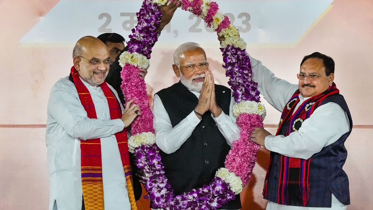 Union Minister Amit Shah (L), Prime Minister Narendra Modi (C), and BJP president J P Nadda (R). Credit: PTI Photo