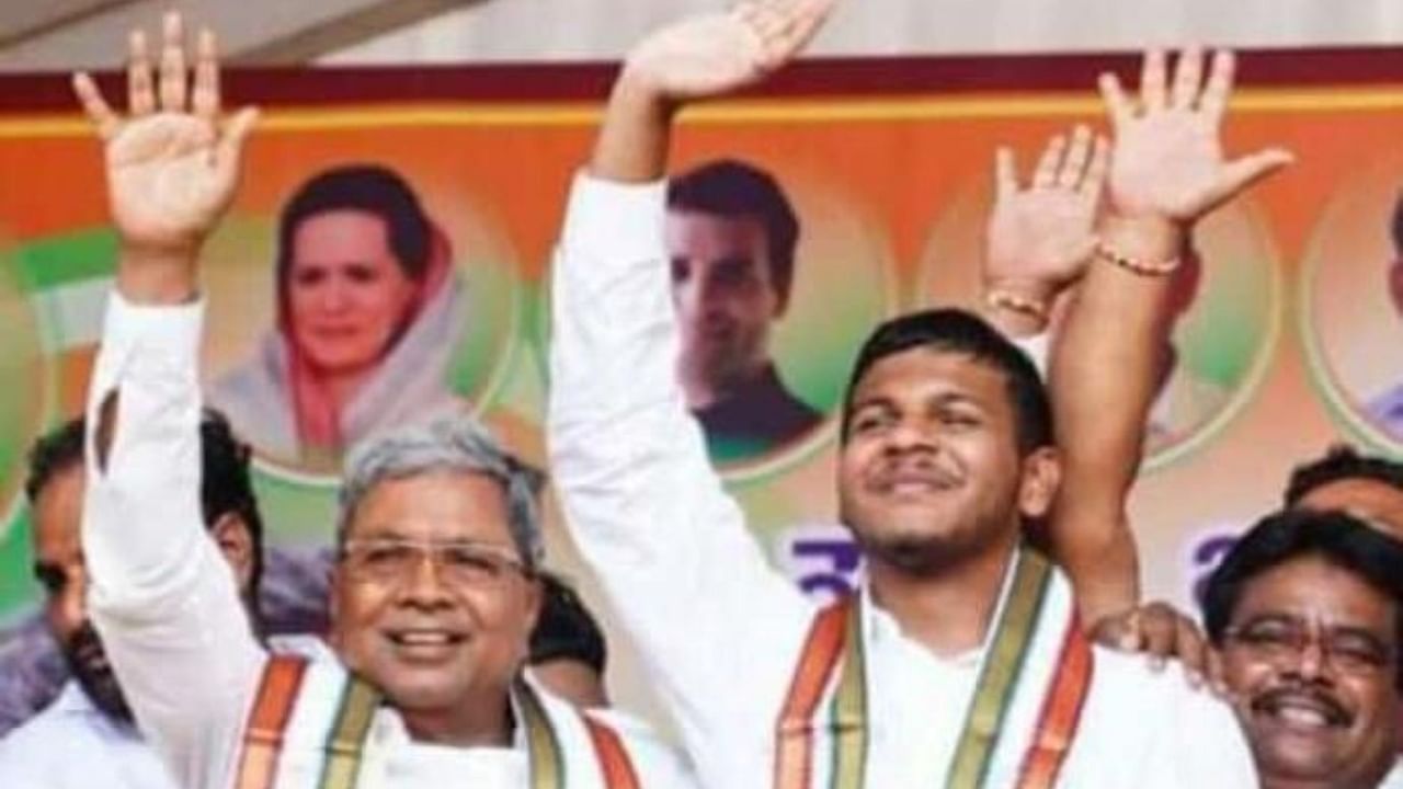 Former chief minister Siddaramaiah along with his grandson Dhavan Rakesh before filing of his nomination papers from Varuna Assembly segment at Nanjangud town of Mysuru district, on April 19, 2023. Credit: DH Photo