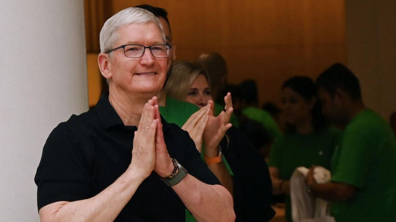 Chief Executive Officer of Apple Tim Cook gestures during the opening of an Apple retail store at a mall in New Delhi on April 20, 2023. Credit: AFP Photo