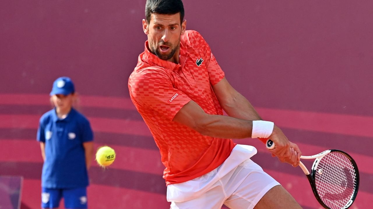 Serbia's Novak Djokovic plays a backhand return to Serbia's Dusan Lajovic. Credit: AFP Photo