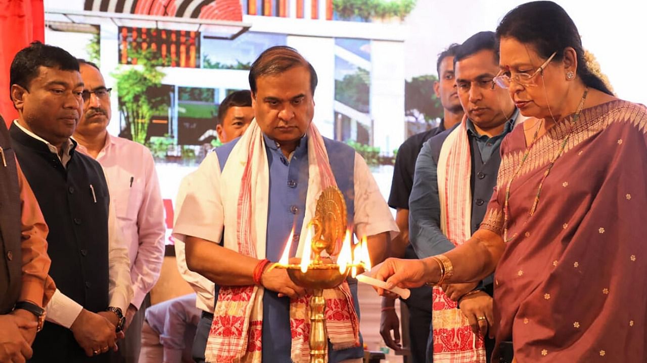 Himanta Biswa Sarma lays the foundation stone of a new Assam House at Dwarka in New Delhi. Credit: PTI Photo