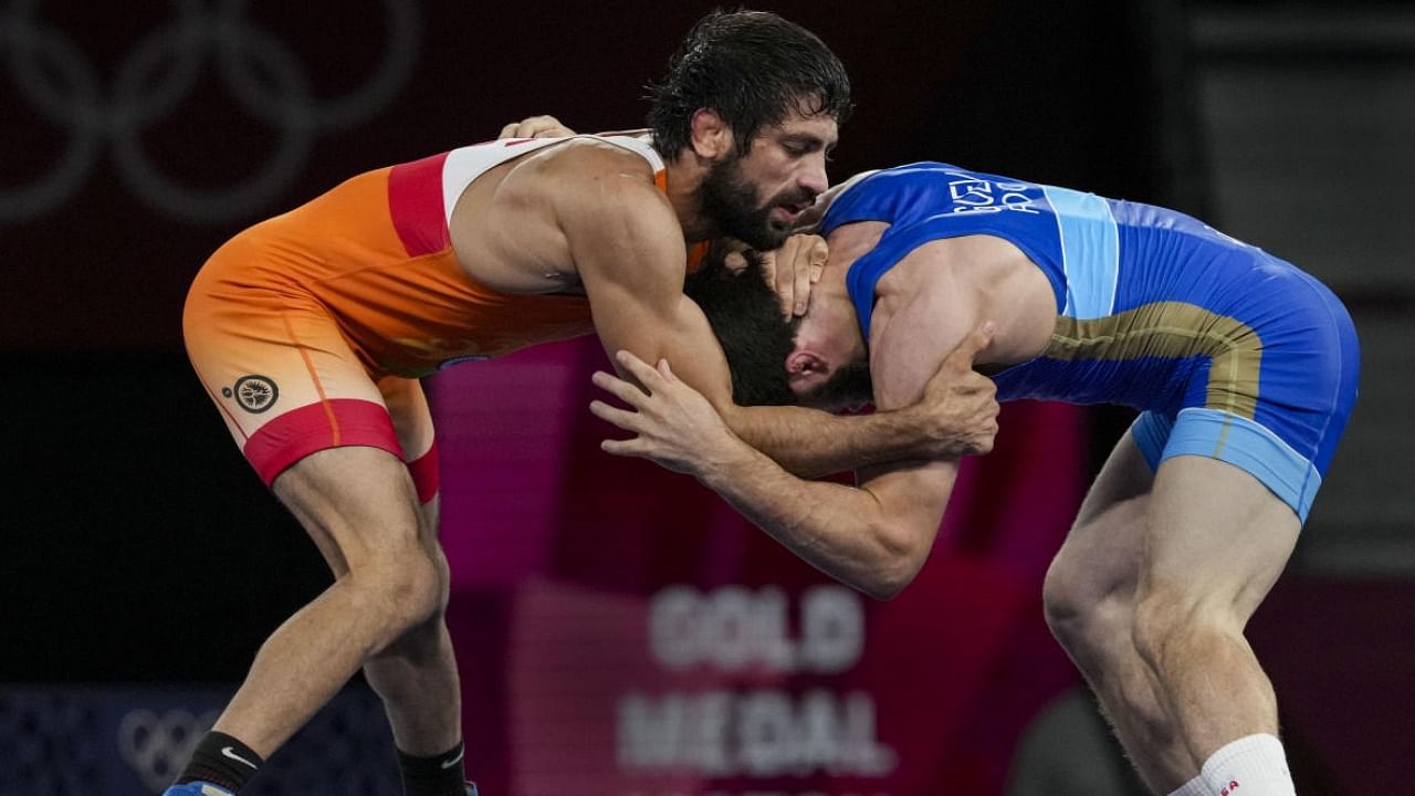 India has had good success with wrestling at third spot with 114 (49 gold, 39 silver and 26 bronze) medals. Credit: AFP Photo 