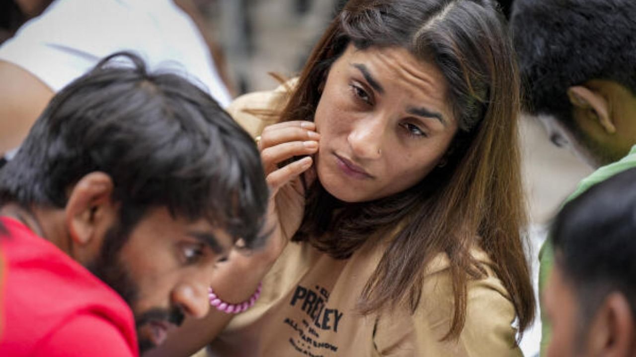 Wrestlers Bajrang Punia and Vinesh Phogat during their protest at Jantar Mantar in New Delhi. Credit: PTI Photo