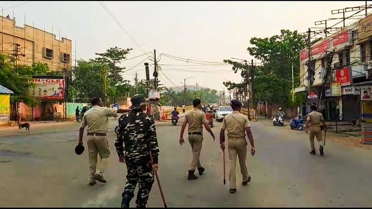 Security personnel during a curfew imposed after the incident of fresh violence on the occasion of Hanuman Jayanti, in Sambalpur. Credit: PTI File Photo