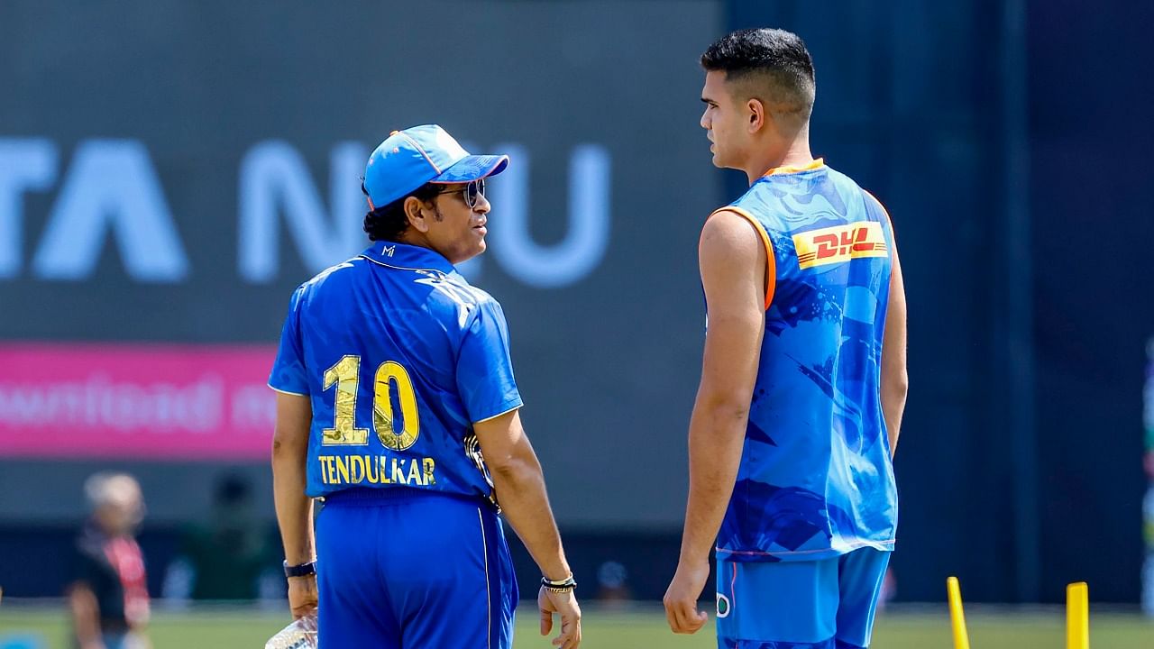 Sachin Tendulkar with his son Arjun Tendulkar. Credit: PTI Photo