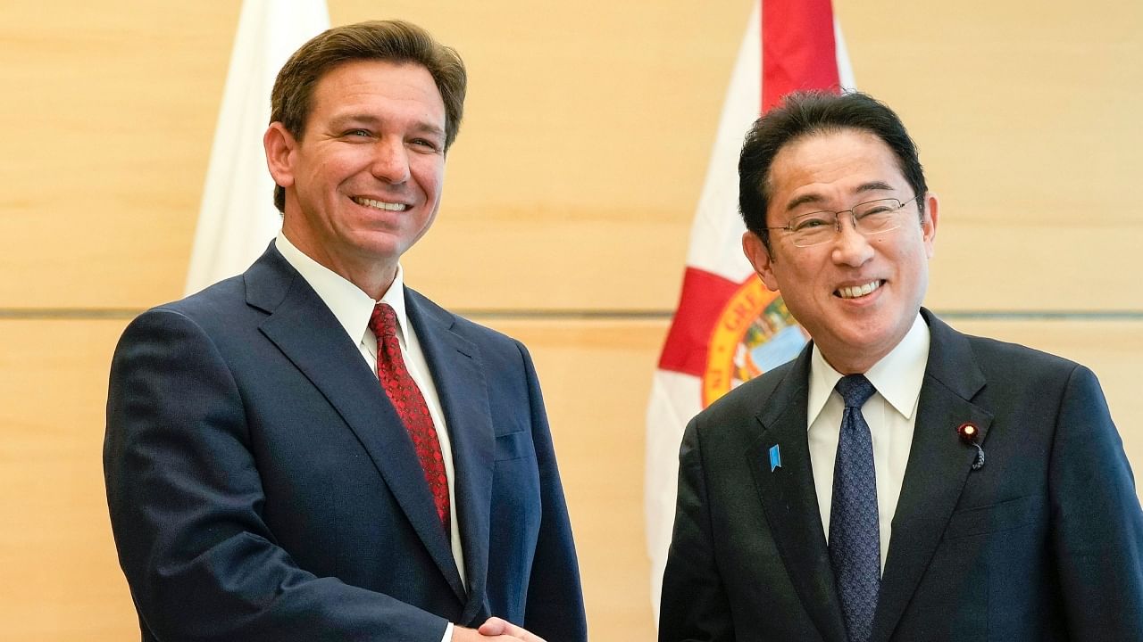 Florida Governor Ron DeSantis, left, shakes hands with Japanese Prime Minister Fumio Kishida as he pays a courtesy call to Kishida at the prime minister's official residence in Tokyo Monday, April 24, 2023. DeSantis is in Japan for a two-day visit. Japanese Foreign Ministry said that DeSantis's visit to Japan will be an opportunity to further strengthen relationship between Japan and Florida in broad areas including political and economic fields. Credit: AP/PTI Photo