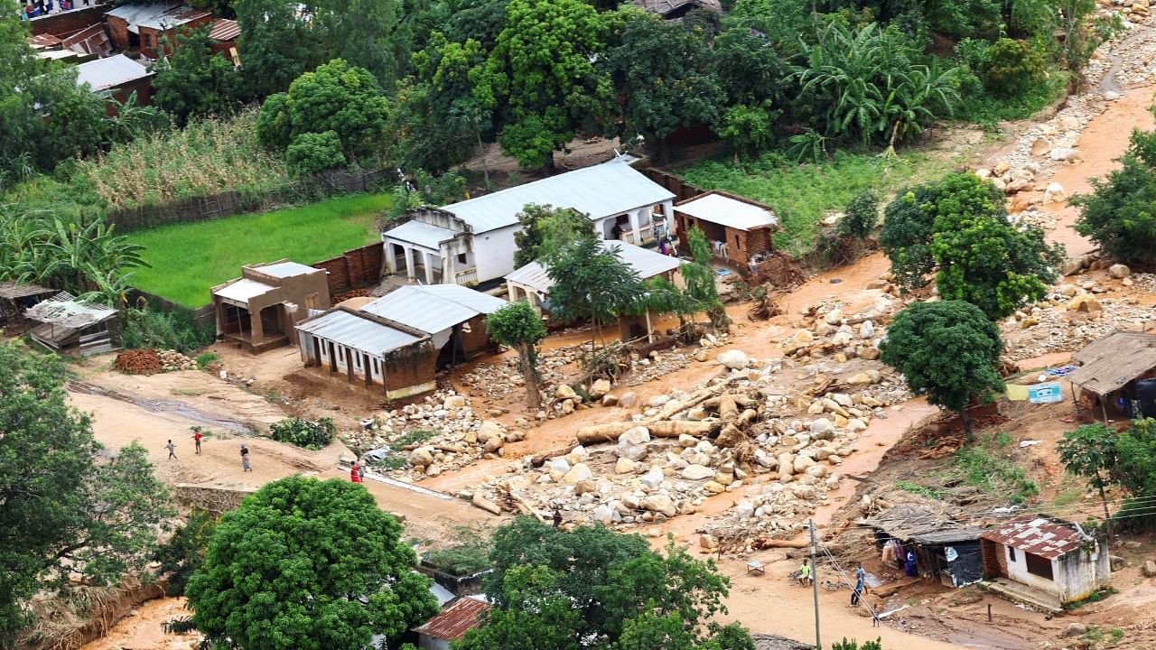 An aerial view shows houses which were damaged in Muloza on the border with Mozambique after Tropical Cyclone Freddy, around 100 km outside Blantyre, Malawi, March 18, 2023. Malaria cases spiked after the cyclone. Credit: Reuters Photo