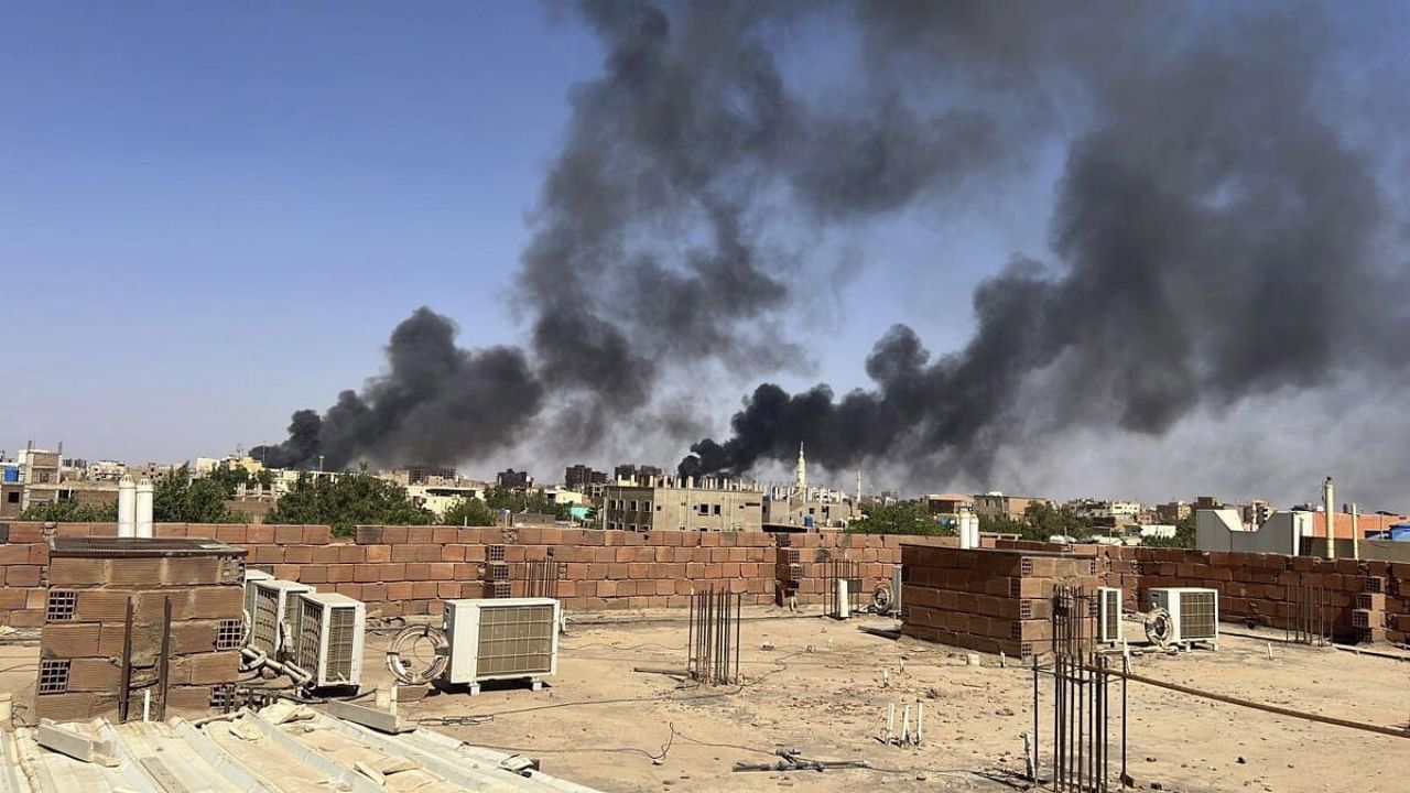 Smoke fills the sky in Khartoum amid the ongoing conflict. Credit: AP/PTI Photo