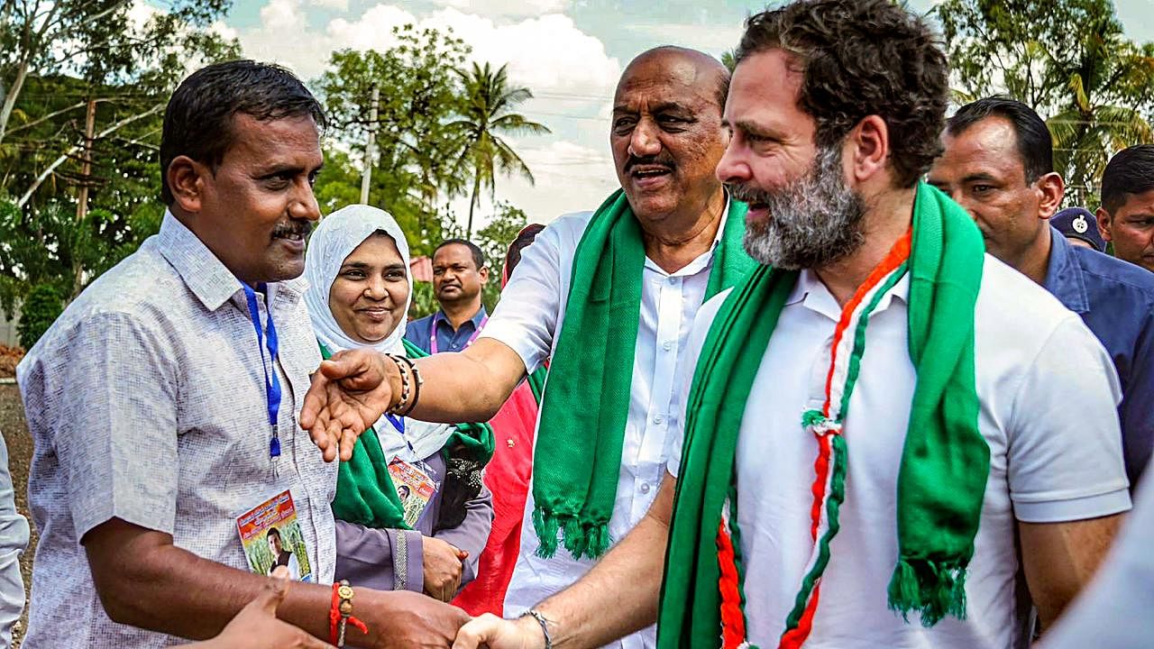 Congress leader Rahul Gandhi during an interaction with sugarcane farmers at Ramdurg, in Belagavi district. Credit: PTI Photo