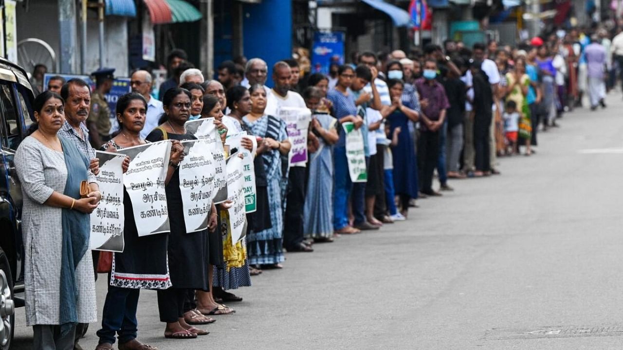 Sri Lankans demonstrate on the fourth anniversary of the Easter Sunday bombings, outside St. Anthony's church in Colombo. Credit: AFP Photo