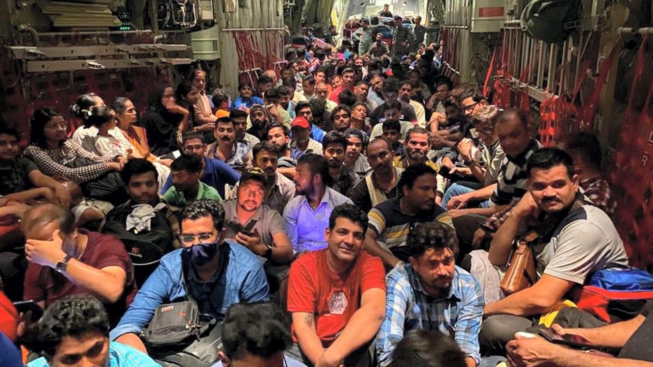 Indian nationals aboard an IAF C-130J aircraft depart from Port Sudan as part of evacuation operations under Operation Kaveri. Credit: PTI Photo