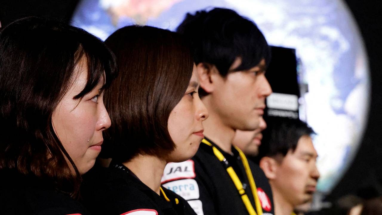 Employees of "ispace" react after the company announced they lost signal from the lander in HAKUTO-R lunar exploration program on the Moon at a venue to watch its landing in Tokyo. Credit: Reuters Photo