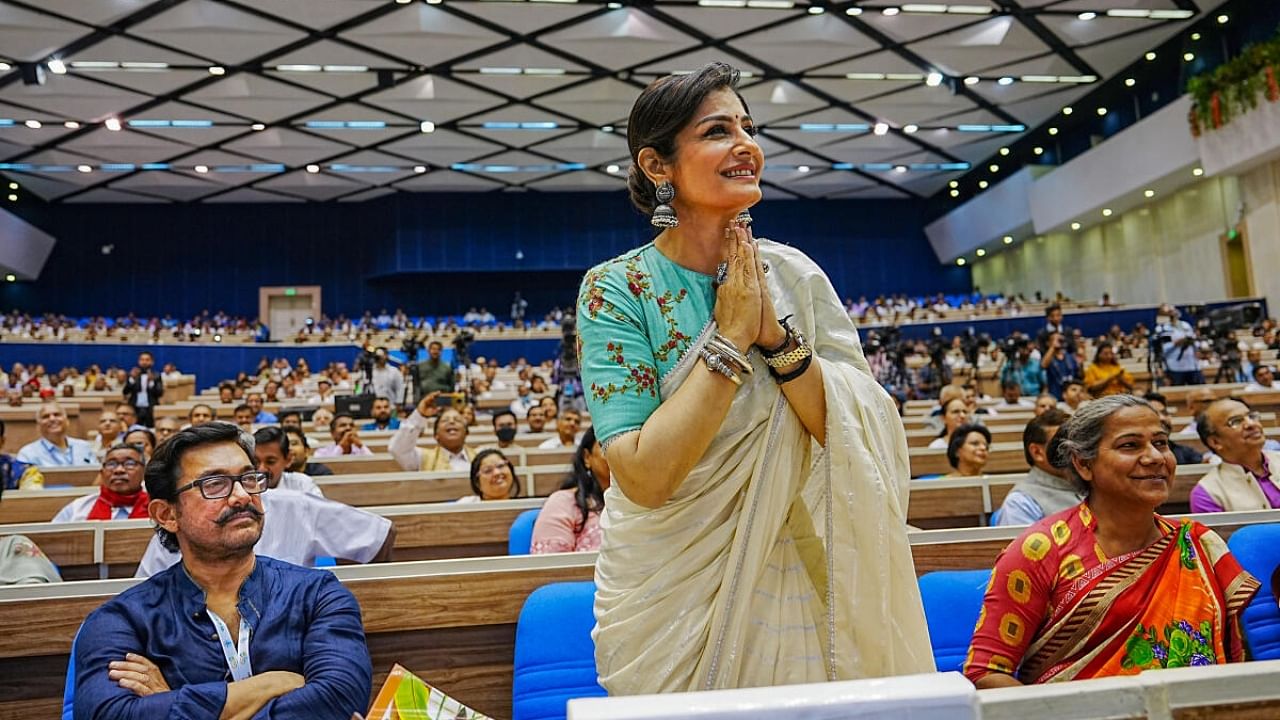 Raveena Tandon during the inauguration of a national conclave on 'Mann ki Baat @100', in New Delhi. Credit: PTI Photo