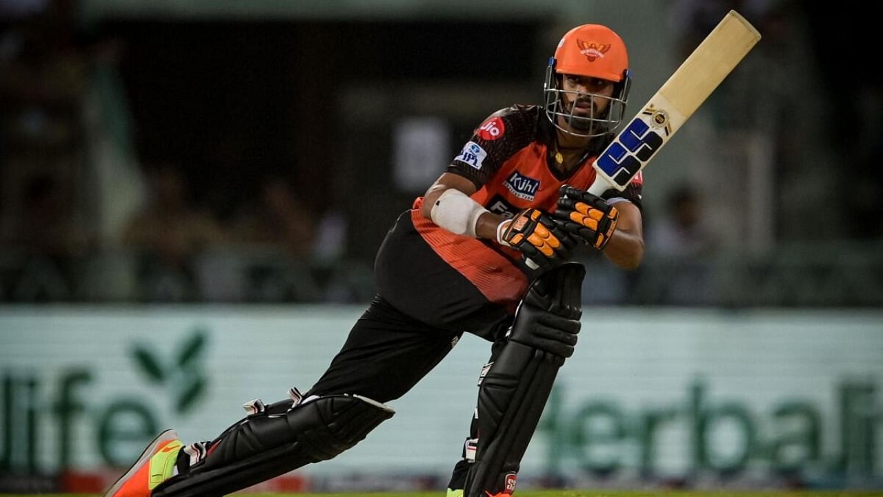 Sunrisers Hyderabad's Washington Sundar watches the ball after playing a shot during the Indian Premier League (IPL) Twenty20 cricket match between Lucknow Super Giants and Sunrisers Hyderabad at the Ekana Cricket Stadium in Lucknow on April 7, 2023. Credit: AFP Photo