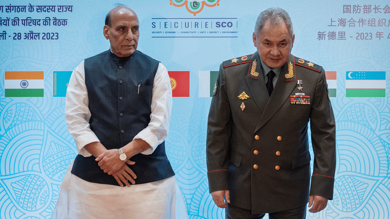 Russian Defence Minister Sergei Shoigu and his Indian counterpart Rajnath Singh pose for a picture before start of the Shanghai Cooperation Organisation meet in New Delhi. Credit: Reuters Photo