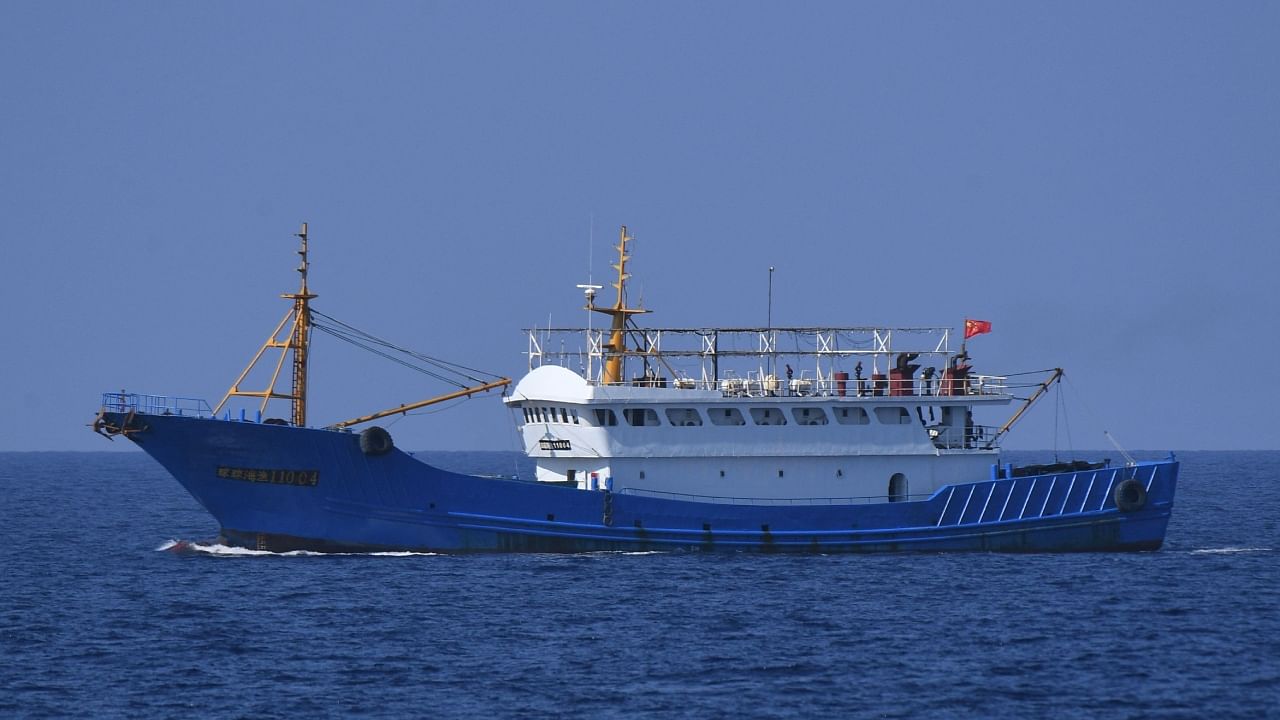 This photo taken on April 21, 2023 shows one of the Chinese vessels driven away by the Philippine coast guard ship Malabrigo sailing near the Philippine-occupied Thitu island in the disputed South China Sea. Credit: AFP Photo